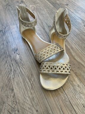 Thalia Sodi gold sandal with crystal embellishments